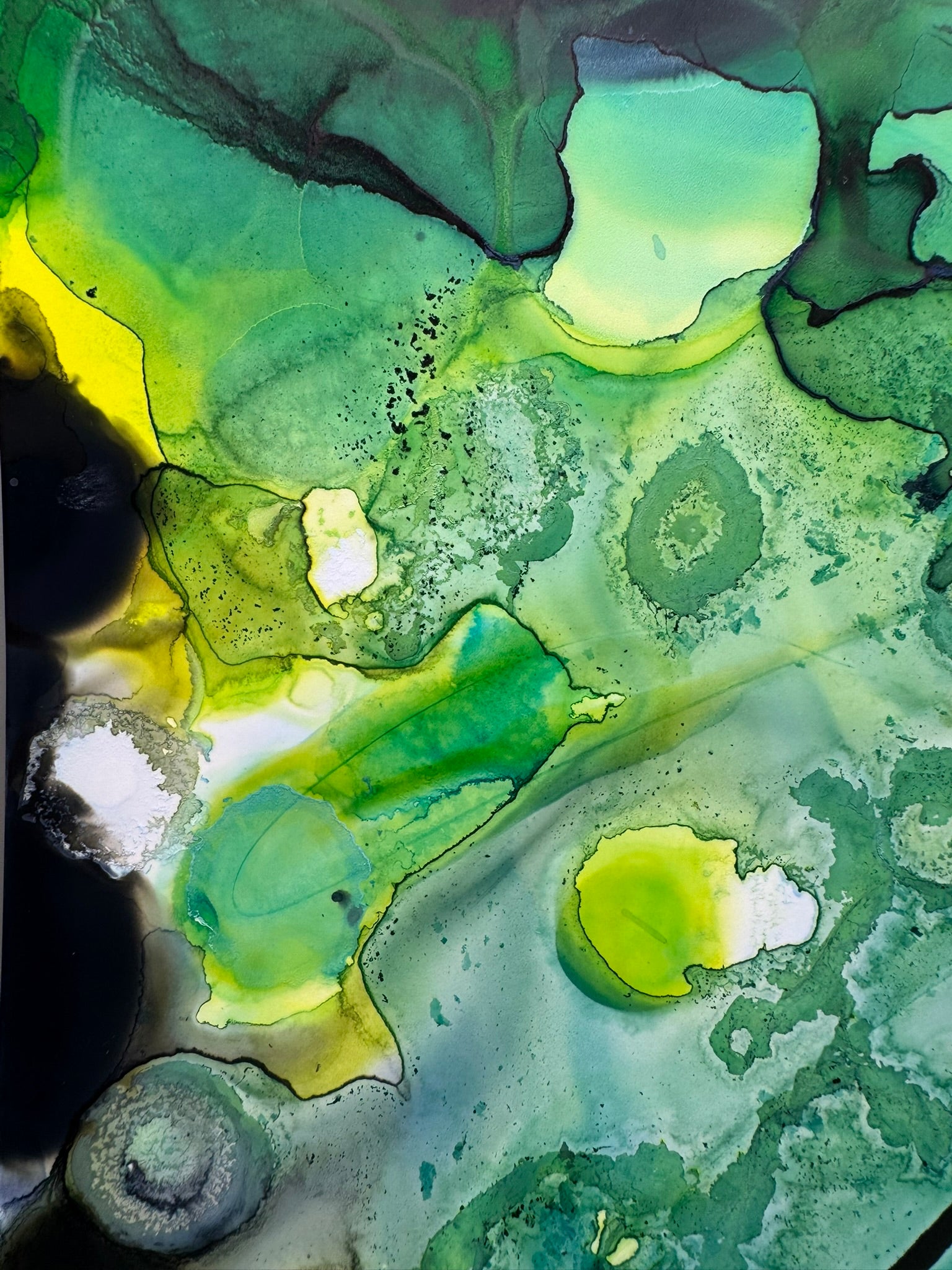 Abstract art with green, yellow, and black colors