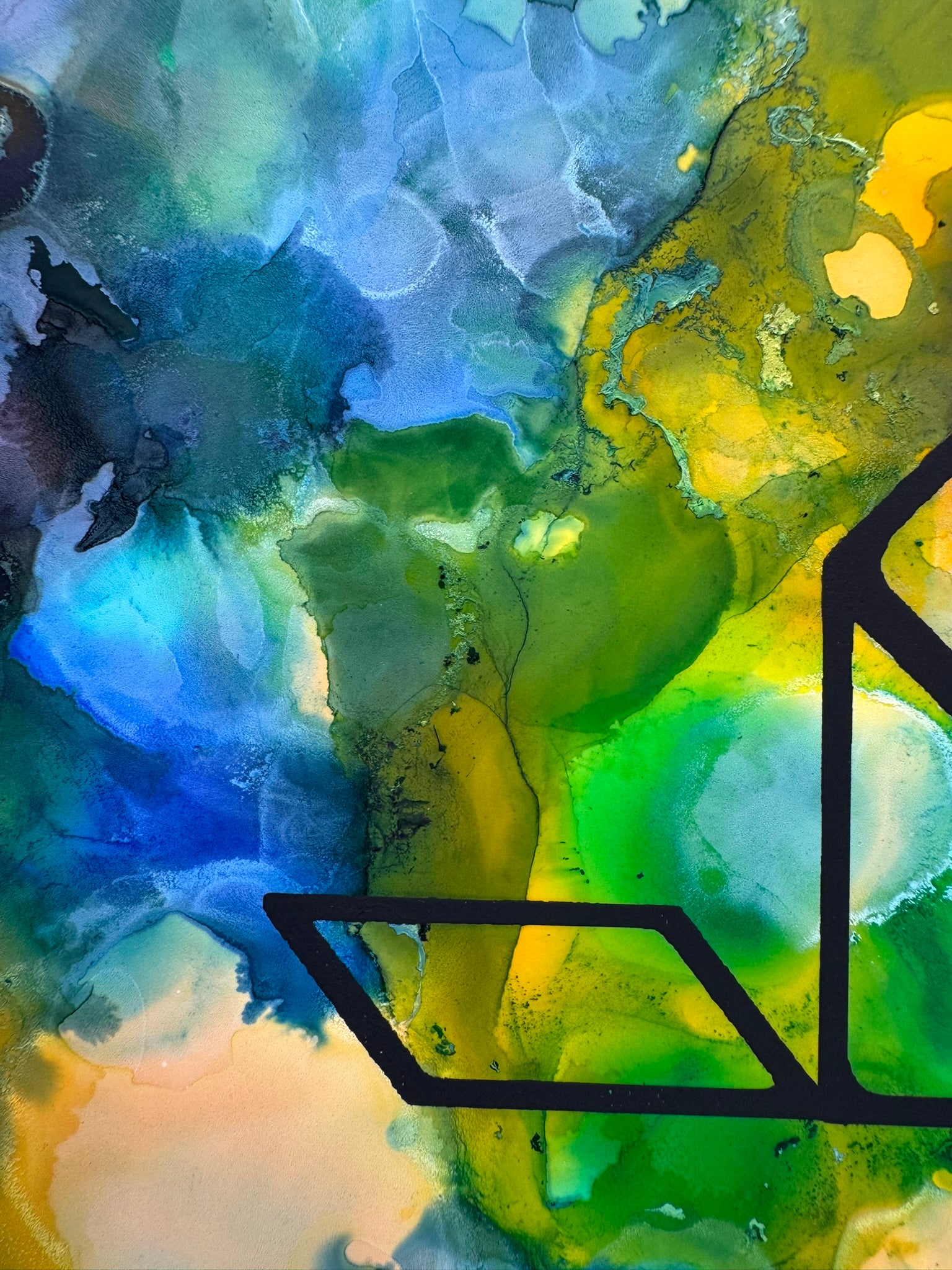 Abstract artwork with blue, green, and yellow colors