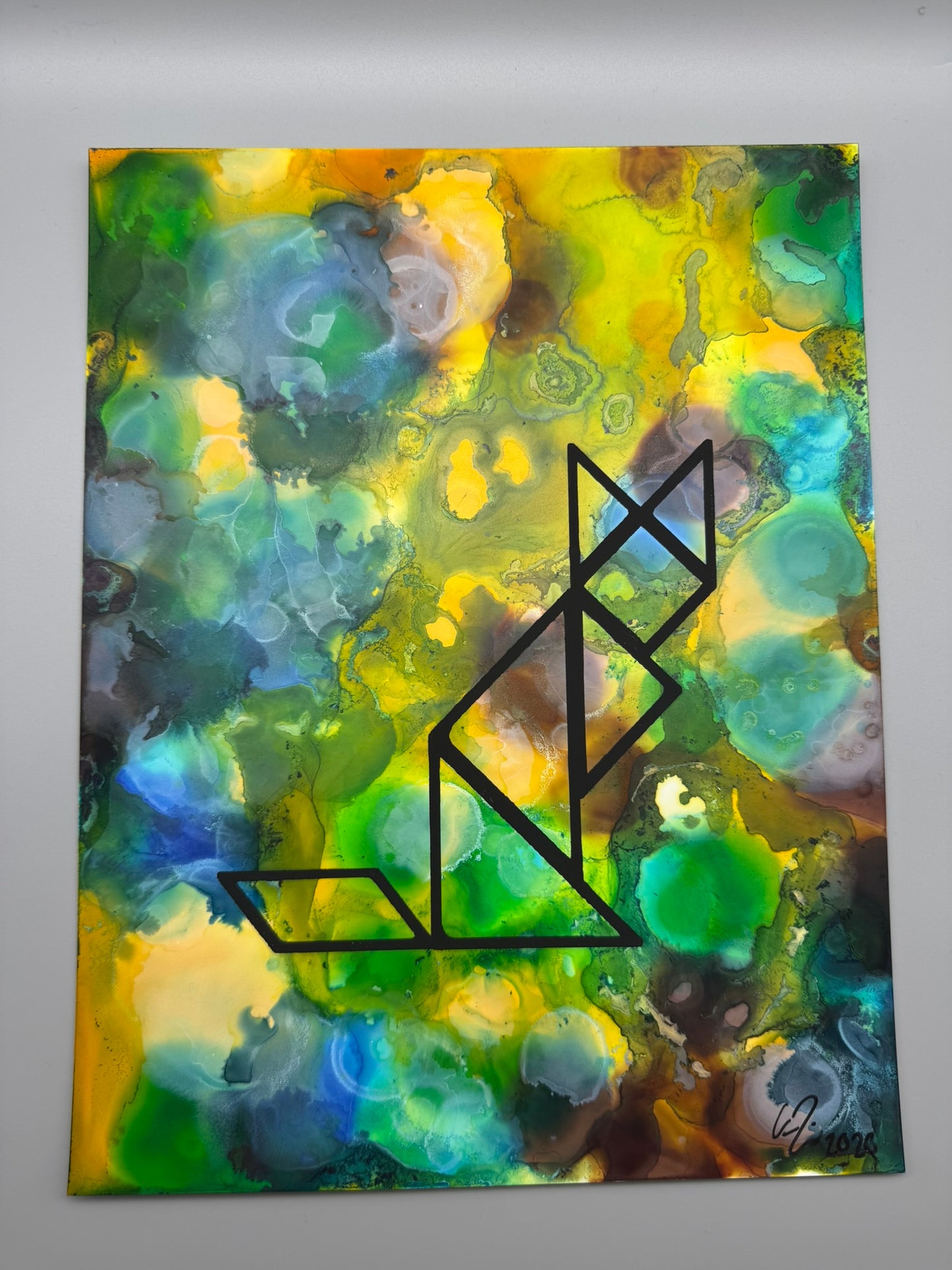 Abstract painting with geometric design on a colorful background