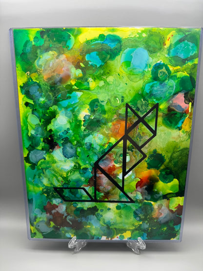 Abstract art piece with a black geometric design on a colorful background